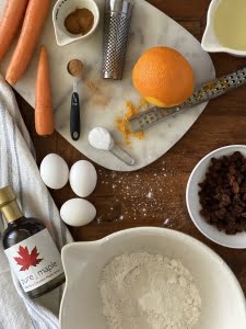 Maple syrup, carrots, sultanas, orange, spices, eggs, oil, flour