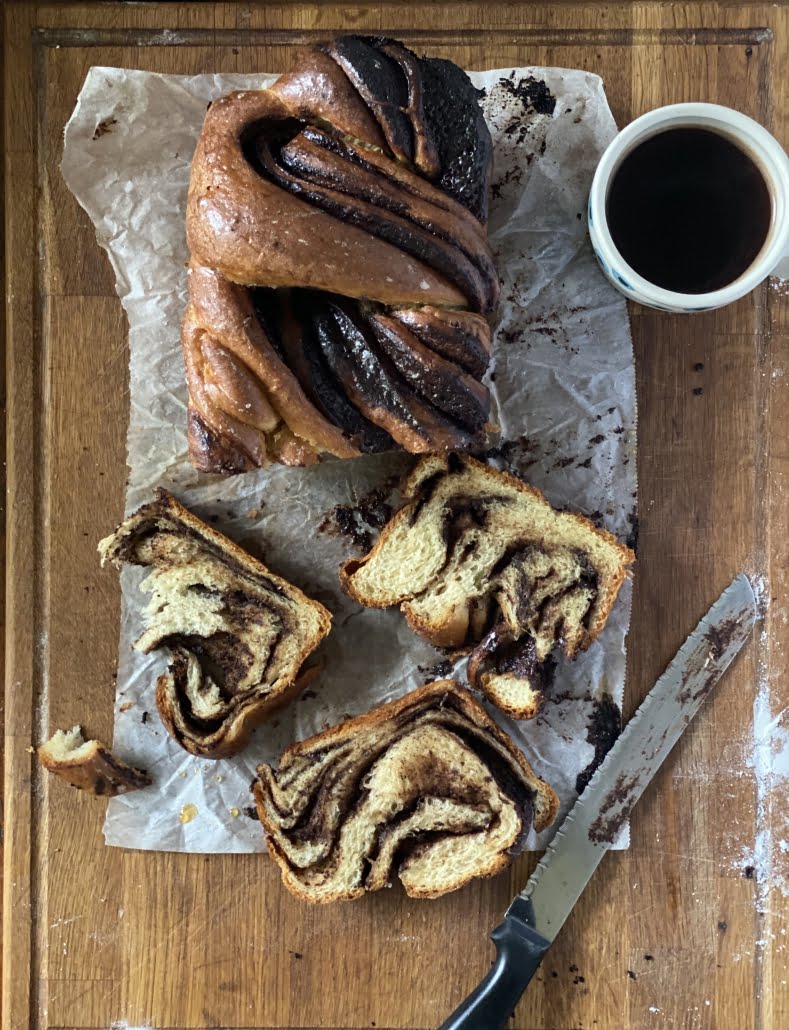 Chocolate Babka - 3 slices cut and 1 piece torn with a cup of coffee - Pure Maple