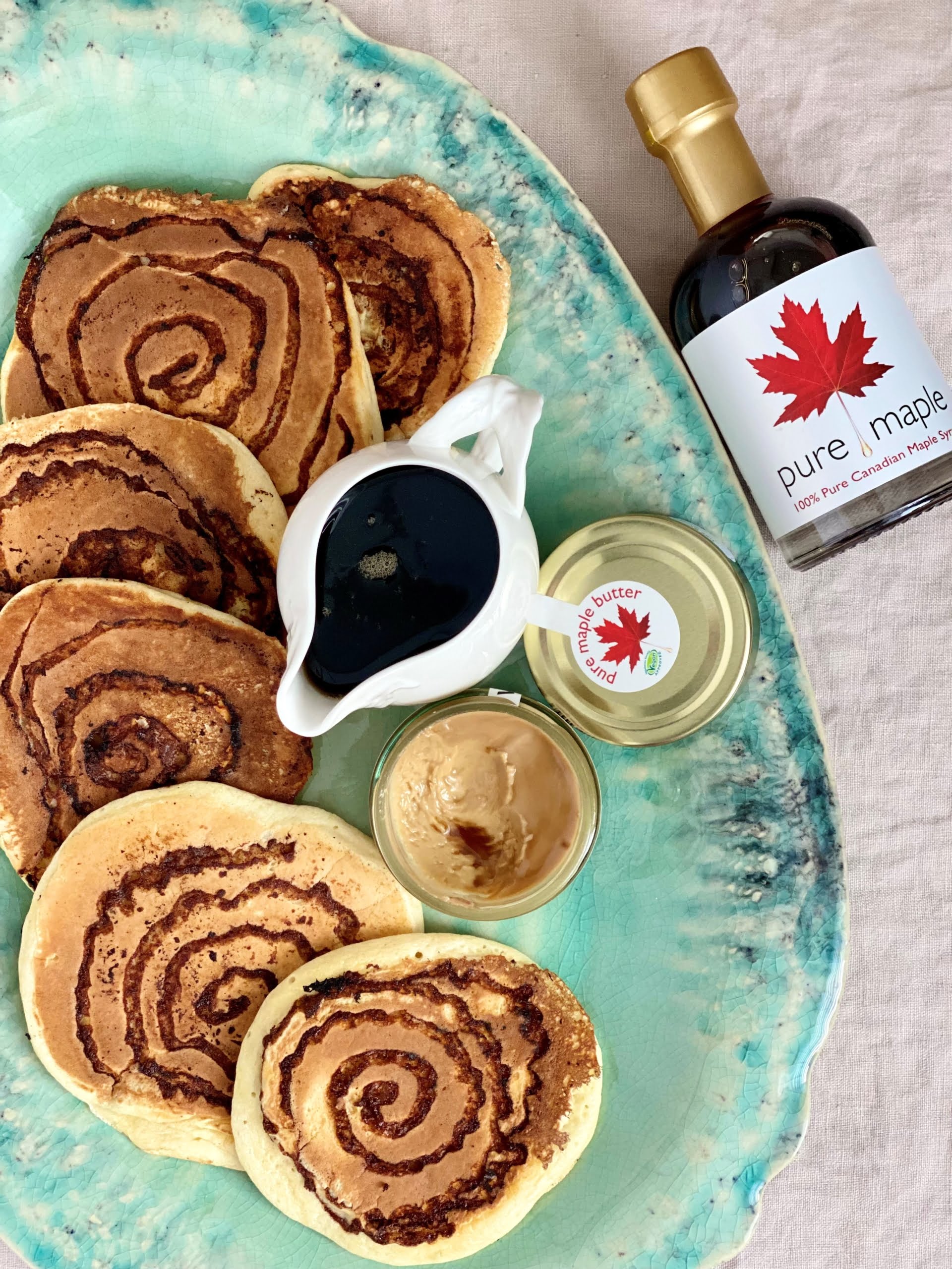Platter with Maple and Cinnamon Swirl Pancakes served with maple butter and maple syrup - Pure Maple